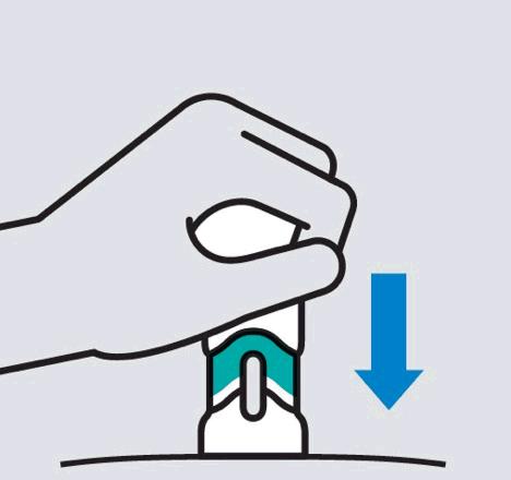 Натиснете дръжката право надолу Лекарството се инжектира, докато натискате.
