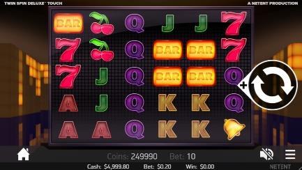 Графика на Twin Spin Deluxe за сензорен екран Изскачащ екран Основна игра Играчите могат да изберат стойността на жетоните и нивото на залагане, преди да завъртят барабаните.